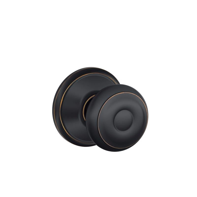 Schlage Georgian Aged Bronze Passage Door Knob 1-3/4 in.